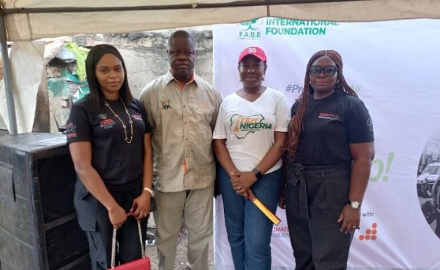 LAWMA, FABE Foundation and Prudential Zenith Life Assurance officials at the fruit market clean up in Lagos