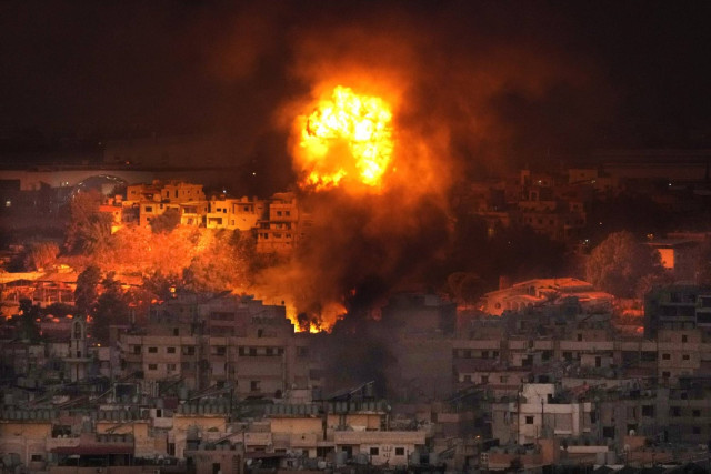 Flames rise after an Israeli airstrike in the southern suburbs of Beirut, Lebanon, Saturday, Sept. 28, 2024