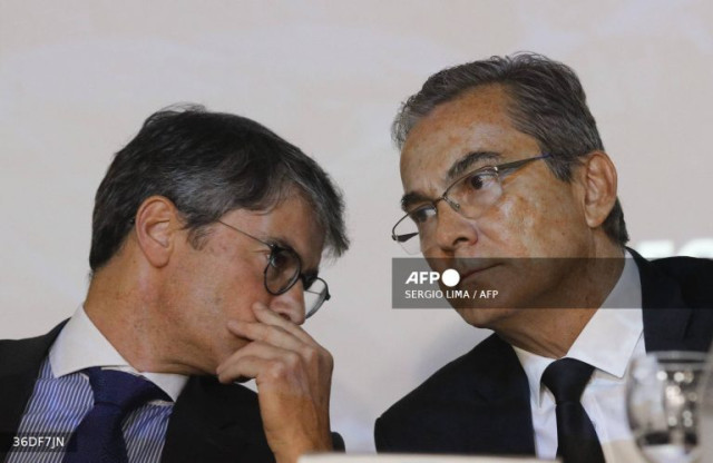 Ricardo Catanant (L) and Luiz Ricardo Nascimento, directors of the Brazilian National Civil Aviation Agency (ANAC), participate in a press conference about the plane that crashed in Vinhedo, Sao Paulo State, killing 61 people, in Brasilia on August 9, 202