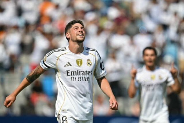 Real Madrid's Uruguayan midfielder #08 Federico Valverde celebrates after scoring his team's third goal during the FIFA Club World Cup 2025 Group H football match between Spain's Real Madrid and Mexico's Pachuca at the Bank of America stadium in Charlotte