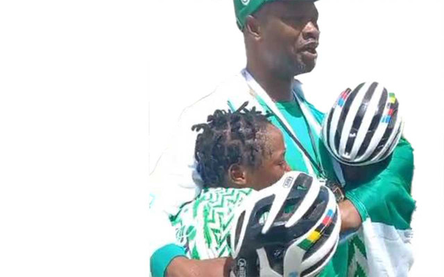 Team Nigeria athletes celebrate with their coach at the 1st African School Games holding in Algeria