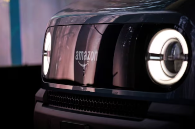 Amazon EV van powered by Rivian is parked at the Amazon Logistics Facility in Chicago, Illinois, US, July 21, 2022