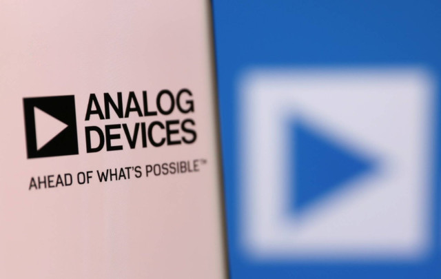 Analog Devices' logo is pictured on a smartphone in this illustration taken, December 4, 2021.