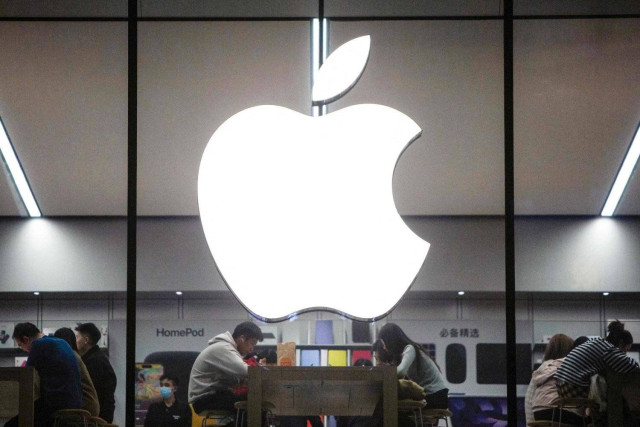 People visiting an Apple store in Shenyang, in China's northeastern Liaoning province