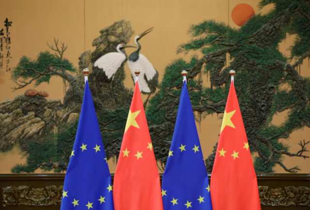 Flags of European Union and China are pictured during the China-EU summit at the Great Hall of the People in Beijing, China, July 12, 2016