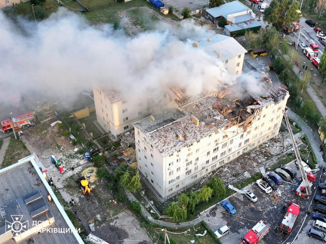 Photograph taken and released by the Ukrainian Emergency Service on August 18, 2025, shows a damaged residential building following an air attack, in Kharkiv, amid the Russian invasion of Ukraine. Three people were killed and more than a dozen wounded by 