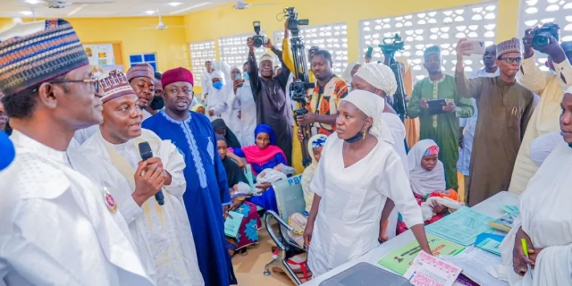 From left: Gov. Buni, Commissioner Health, Dr. Lawan Gana, Executive Sec. Yobe Primary Health Care Management Board, Dr. Kundi Machina at the Gwange PHC interacting with nurses during the commission