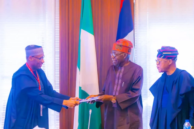 President Bola Tinubu receiving the report of the High Powered Presidential Committee, HPPC