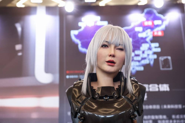 A human looking robot performs movements during the 2024 World Robot Conference at Etrong International Exhibition and Convention Center in Beijing, China, 22 August 2024