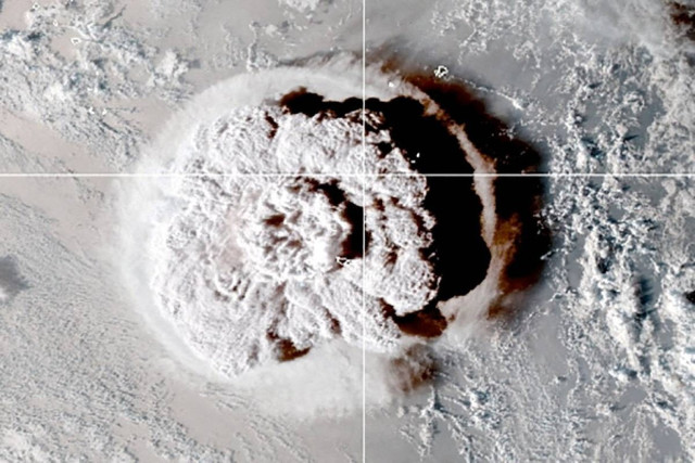 The eruption of an underwater volcano off Tonga, is seen in an image from the NOAA GOES-West satellite taken at 05:00 GMT January 15, 2022