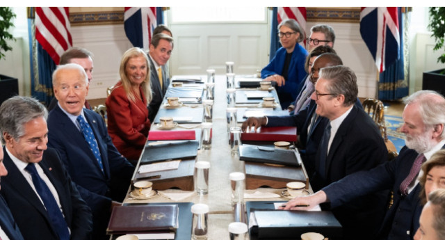 US Secretary of State Antony Blinken (L), US President Joe Biden (2L) and British Prime Minister Keir Starmer (R) participate in a bilateral meeting in the Blue Room of the White House in Washington, DC, on September 13, 2024.