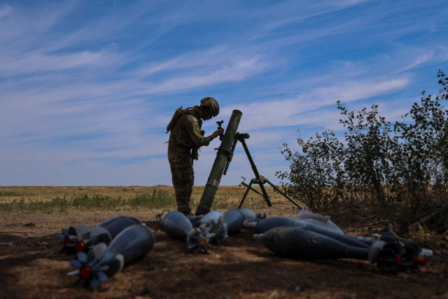 A Ukrainian serviceman checks a mortar during a military exercise, amid Russia's attack on Ukraine, in Kherson region, Ukraine August 1, 2024.