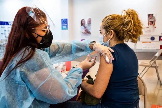 picture of A patient getting treatment from an health care officer