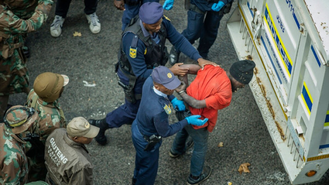 South Africa security operatives capturing a Foreign National