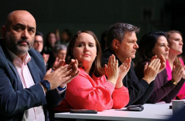 Germany's Greens party co-leaders Omid Nouripour, Ricarda Lan, German Economy and Climate Protection Minister Robert Habeck and German Foreign Minister Annalena Baerbock applause during the 49th Greens party convention in Rheinstetten, near Karlsruhe, Ger