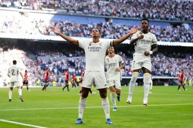 Jude Bellingham central midfield of Real Madrid and England celebrates after scoring his sides first goal during the LaLiga EA Sports match between Real Madrid CF and CA Osasuna at Estadio Santiago Bernabeu on October 7, 2023 in Madrid, Spain.
