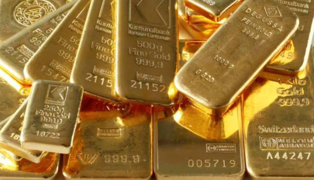 Gold bars from the vault of a bank are seen in this illustration picture taken in Zurich November 20, 2014.