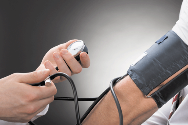 A patient checking his blood pressure