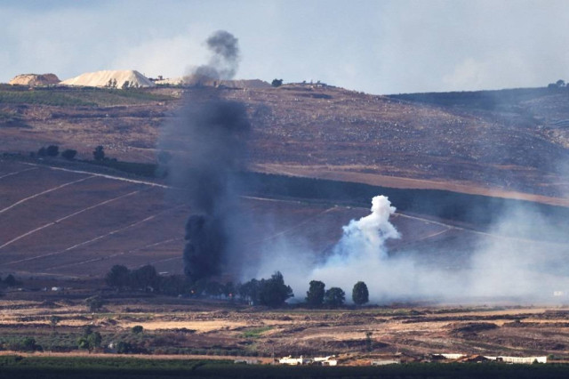 Smoke rises above Lebanon following an Israeli strike, amid the ongoing cross-border hostilities between Hezbollah and Israeli forces, as seen from Israel's border with Lebanon, in Israel, September 16, 2024.