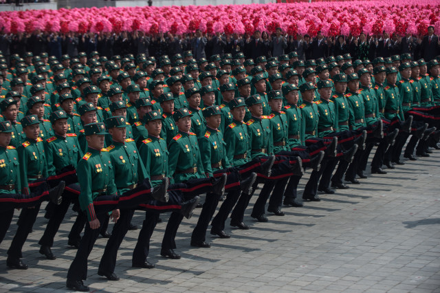 Korean People's Army (KPA) soldiers march on Kim Il-Sung sqaure during a military parade marking the 105th anniversary of the birth of late North Korean leader Kim Il-Sung, in Pyongyang on April 15, 2017