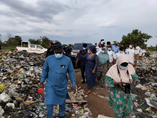 Kwara State Commissioner of Environment, Nafisat Buge, inspecting the dump site discovered along Tunde Idiagbon International Airport road, Ilorin on Thursday.