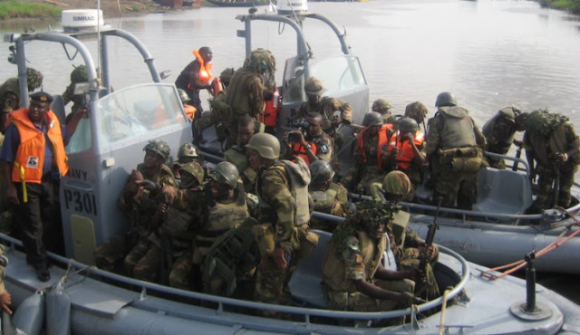 Nigerian Navy on transit in water to illegal oil bunkering site