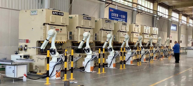 Photo shows robotic arms designed by Zhuang Yongchun and his team