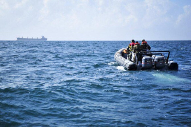 A photo by AU-UN IST shows Ugandan Marines, part of the African Union Mission in Somalia, patrolling the coastline off of the Somali capital of Mogadishu in order to ensure safe passage for flights coming into the city and to protect AMISOM troops on the 