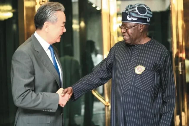 Chinese Foreign Minister, Wang Yi and President Bola Ahmed Tinubu