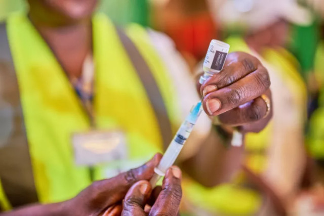 Photo of Health worker with vaccines